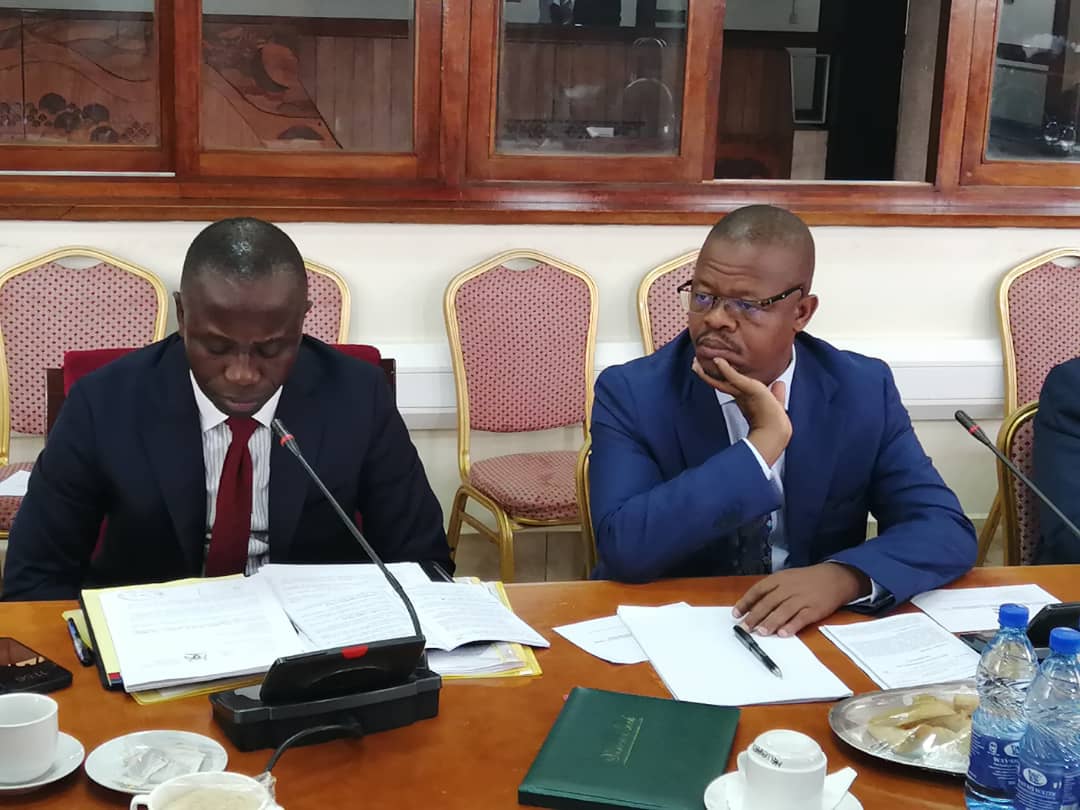 Minister of sports and education Peter Ogwang appearing jointly with engineer Moses Magogo before the education committee