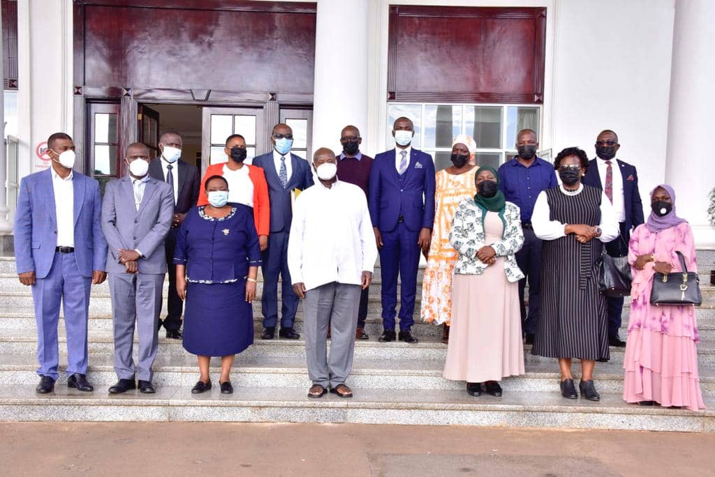 Gen.Yoweri Kaguta museveni with different market stakeholders